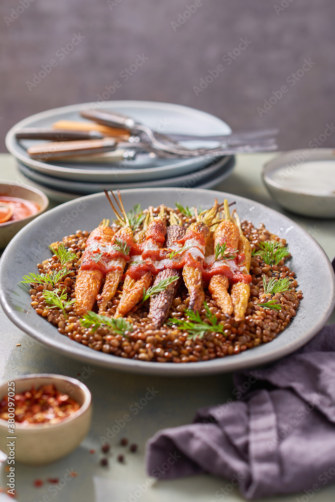 Roasted Heirloom Carrots with Harissa and Yogurt on Lentils Roasted Heirloom Carrots with Harissa and Yogurt on Lentils
