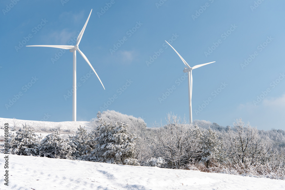 Fototapeta premium Wind turbines on the snow