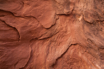 Closeup of rich colors, layers and textures of red rock in Utah
