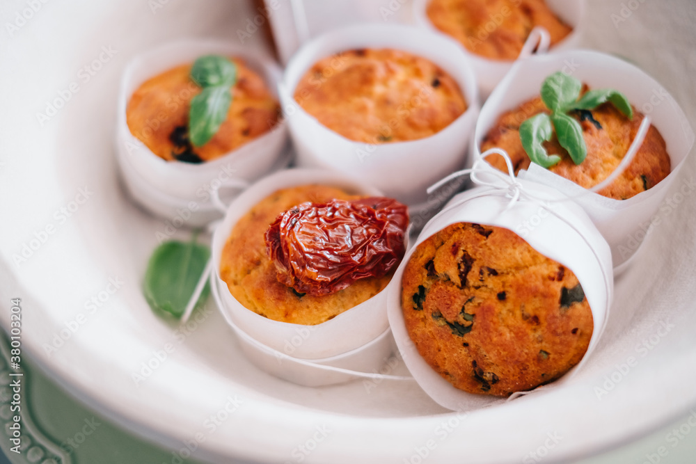 Muffins with dried tomatoes and basil Muffins with dried tomatoes and basil