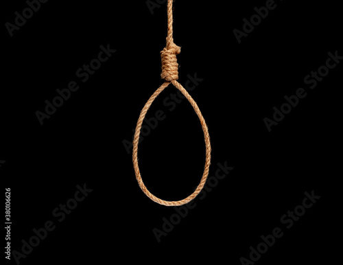 Brown jute rope with non slip mono knot, isolated on white background. photo