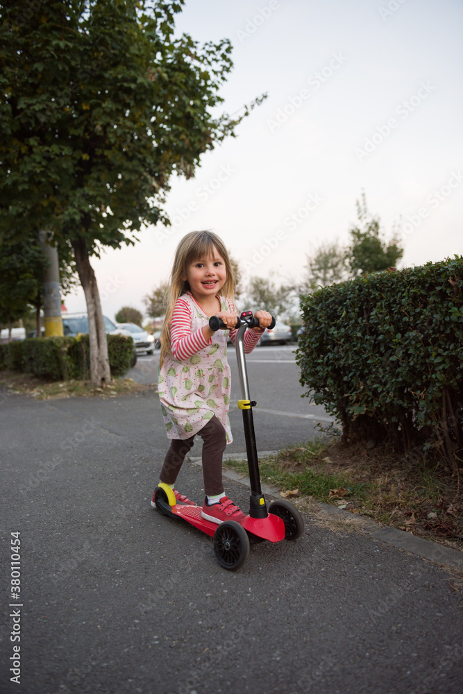 Beautiful three years old girl playing outdoor Beautiful three years old girl playing outdoor