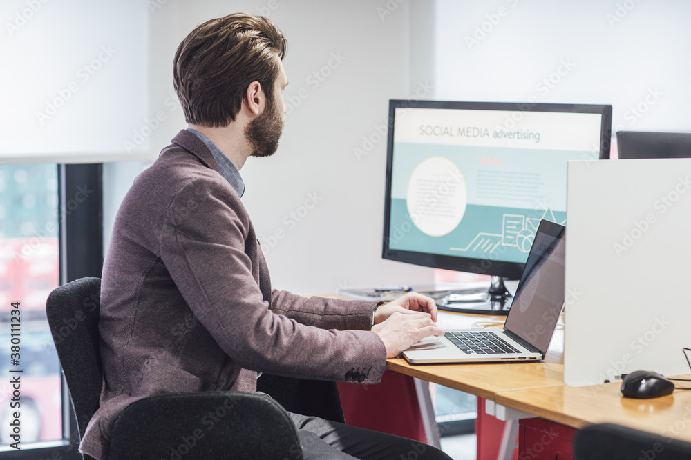 Businessman Working on Computer Businessman Working on Computer