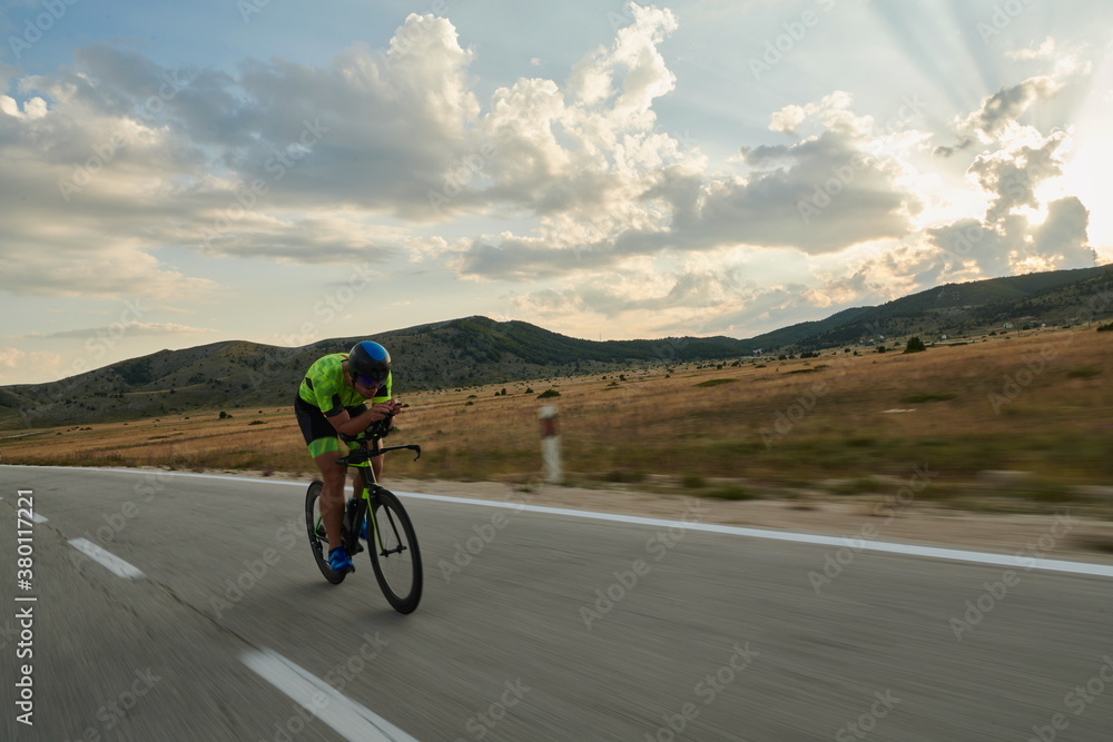 triathlon athlete riding bike triathlon athlete riding bike