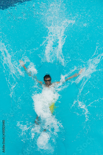 Asian sport man swimming in the pool.