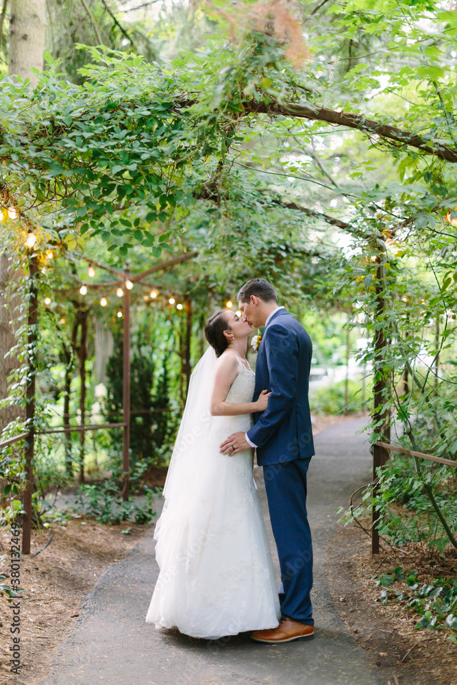 Bride and Groom Kissing at Outdoor Wedding in Oregon Bride and Groom Kissing at Outdoor Wedding in Oregon