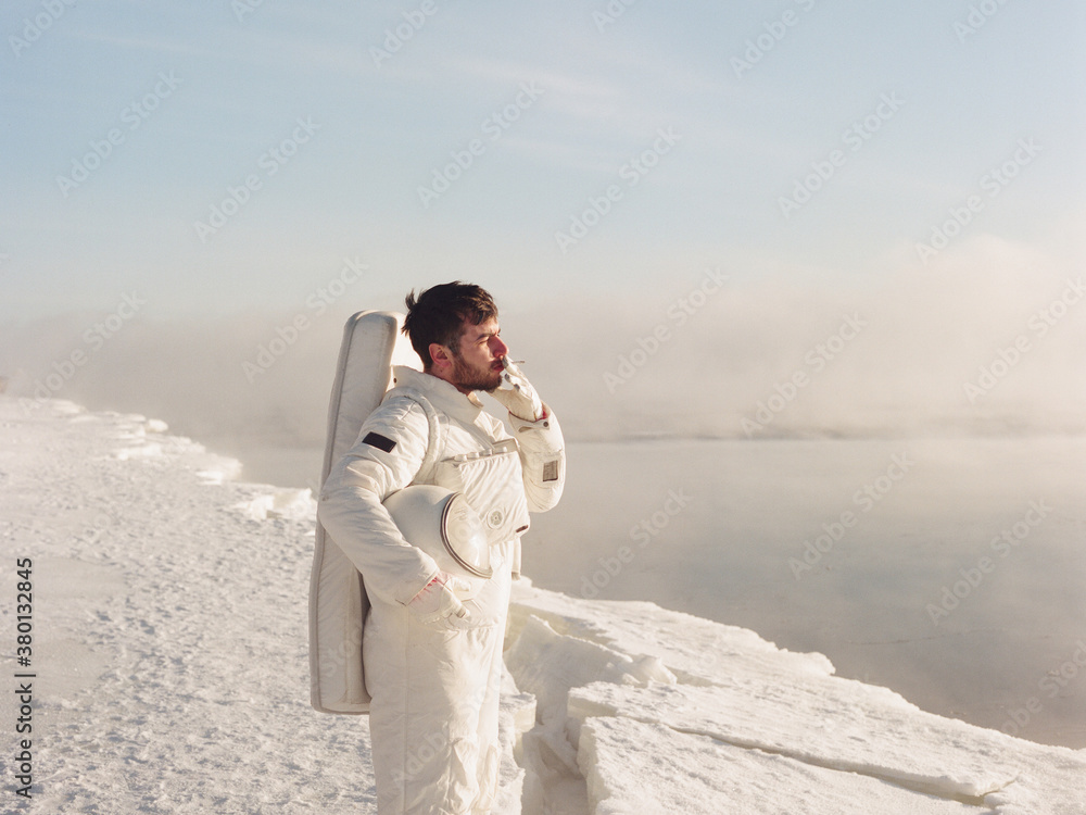 Man in spacesuit smoking