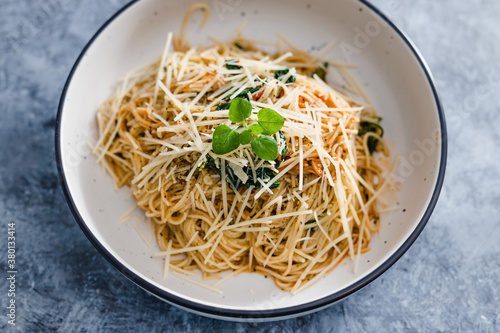 plant-based food, vegan mushroom spaghetti with dairy-free parmesan topping