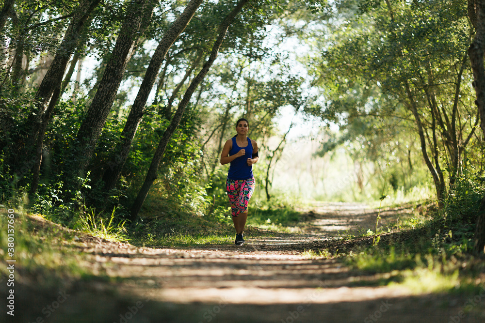 Woman running at park Woman running at park
