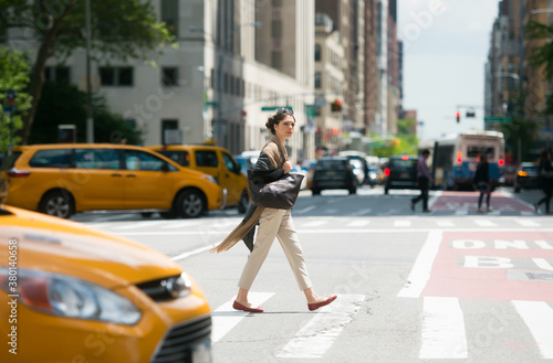 Wallpaper Mural Woman walking in the city Torontodigital.ca