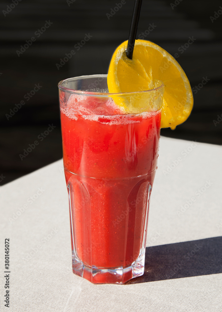 glass of fresh strawberry juice with lemon slice glass of fresh strawberry juice with lemon slice