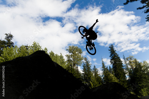 Bike jump silhouette. No hander on dirt jumps photo