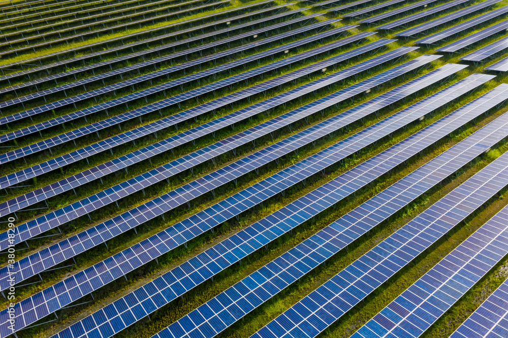 Obraz premium Solar Photovoltaic of aerial top view, solar plant rows array of ground mount system Installation