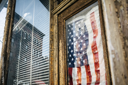 USA flag on the door of a vintage hipster shop in Williamsburg, Brooklyn photo