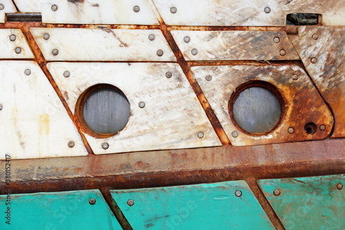 The hull of an old boat appears to have two eyes photo