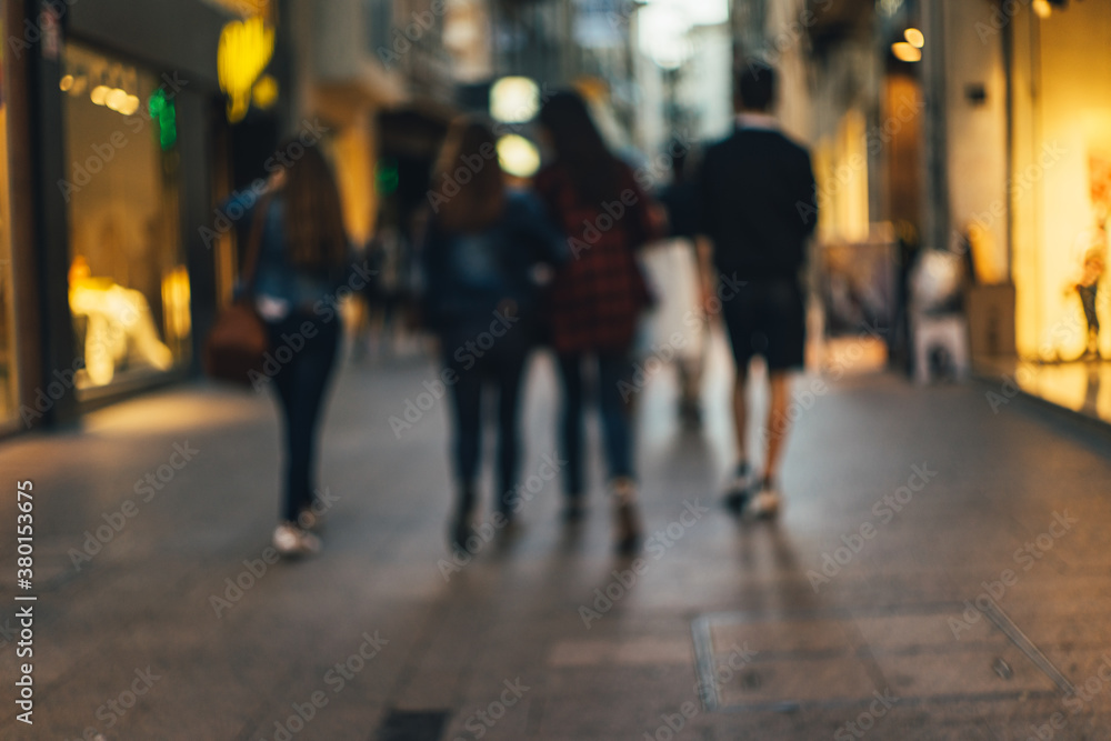 group of people walking on the shopping street group of people walking on the shopping street