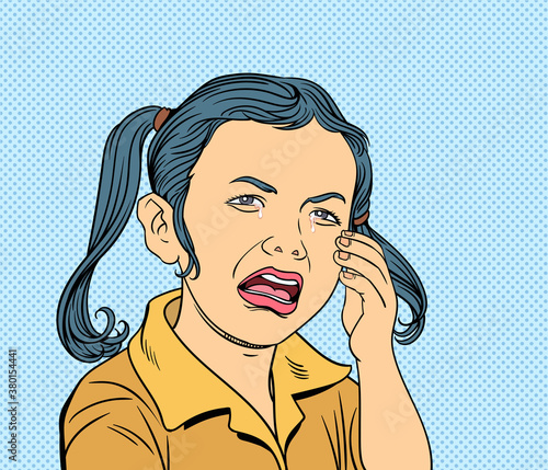 Crying little girl. Pop art vector illustration