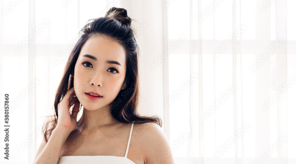 Smiling of cheerful beautiful pretty asian woman clean fresh healthy white skin posing in white clothes.Girl felling relaxing and enjoy time at home.asia beauty