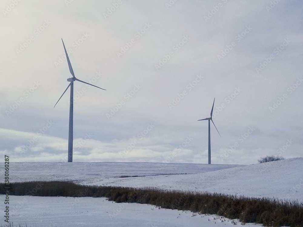 Snowy landscape with windmills. Snowy landscape with windmills.