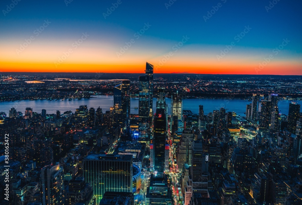 Fototapeta premium sunset over the city New York beautiful view colors orange blue 