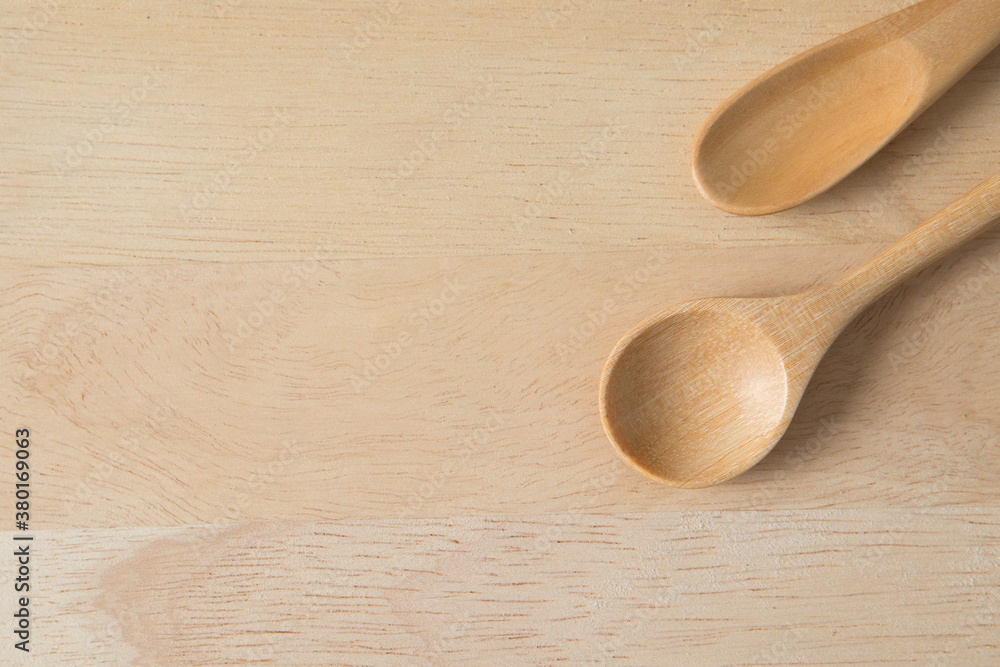 Top view of Wooden scoop on wood background and copy space Top view of Wooden scoop on wood background and copy space