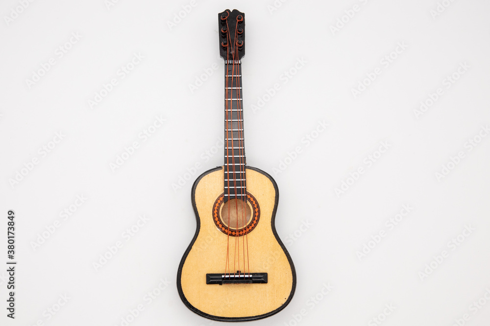 Beautiful sunburst guitar isolated on white background