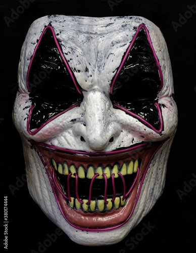Φωτογραφία Laugh Riot Mask Isolated Against Black Background