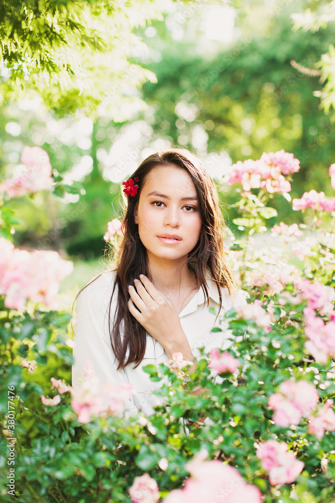 Portrait of a girl in rose garden Portrait of a girl in rose garden
