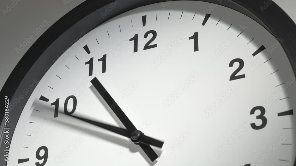 Clock Face in Time Lapse on White Wall in Office Clock Face in Time Lapse on White Wall in Office