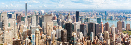 Panoramic view of New York City skyline on a sunny summer day, USA.