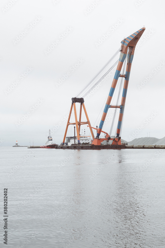 Floating crane at the docks Floating crane at the docks