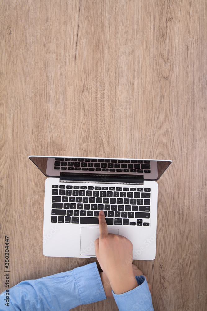 Fototapeta premium One hands typing on the computer keyboard