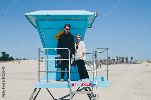 Couple on lifeguard station photo