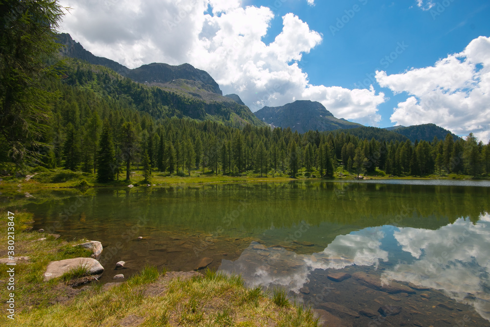 Panoramic view of San Pellegrino lake in San Pellegrino pass: a high mountain pass in the Italian Dolomites