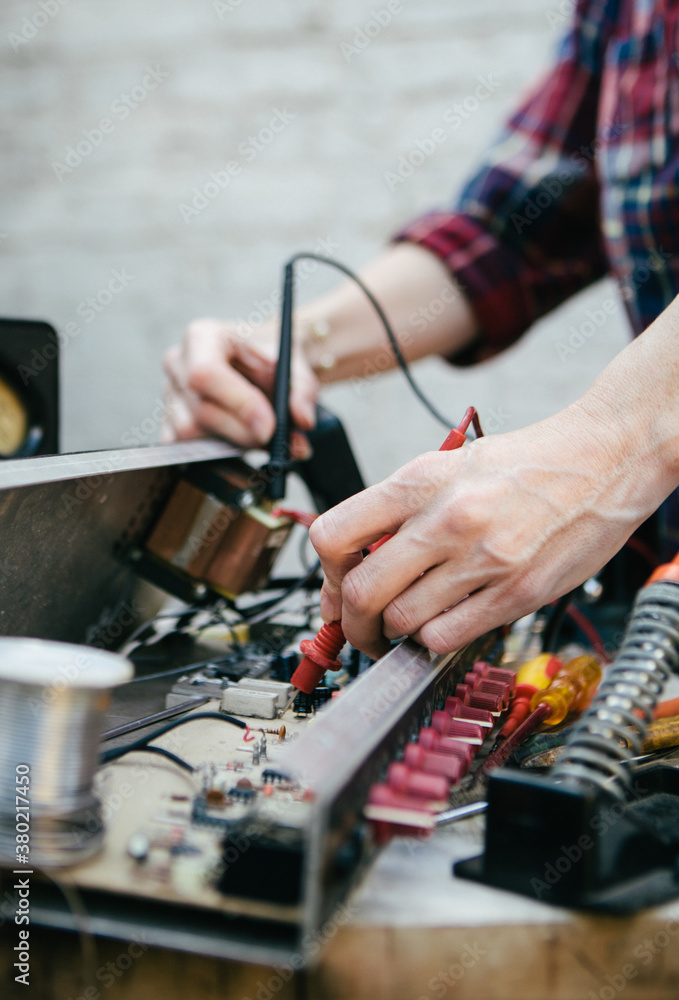 Repairing a circuitboard by soldering. Repairing a circuitboard by soldering.
