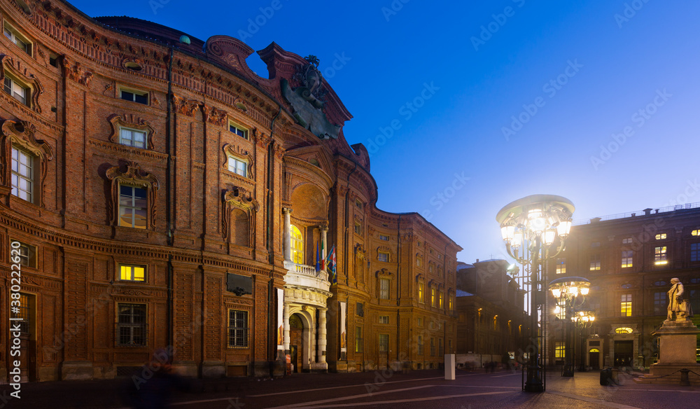 View of Baroque building of Palazzo Carignano in Turin at dusk, Italy