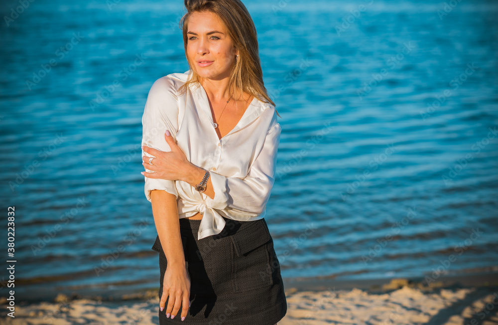 Relax time, elegant woman rest at beach. Nice femininity blonde hair lady, tranquility and freedom concept Relax time, elegant woman rest at beach. Nice femininity blonde hair lady, tranquility and freedom concept