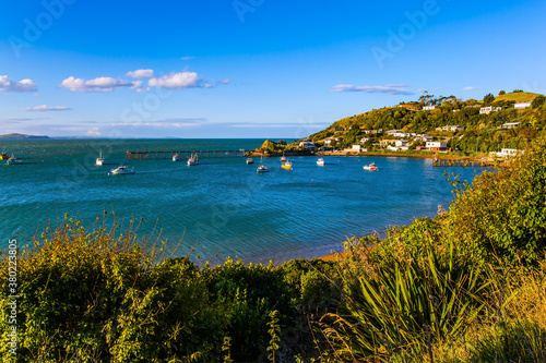 Snow-white scenic yachts at sunset photo