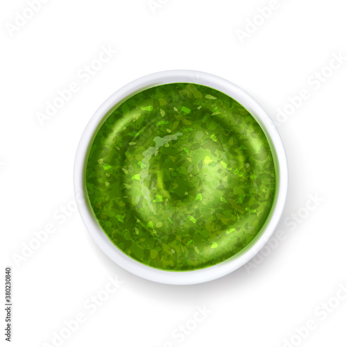 Green pesto sauce in white ceramic bowl on white background, delicious realistic food. Vector illustration.