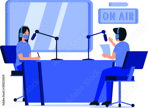 masked man and woman are doing radio broadcast together at the radio studio