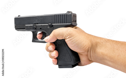 clipping path. Man hand holding airsoft gun isolated on white background. BB gun