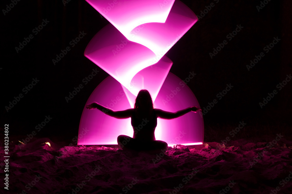 light picture, silhouette of a woman on a purple background