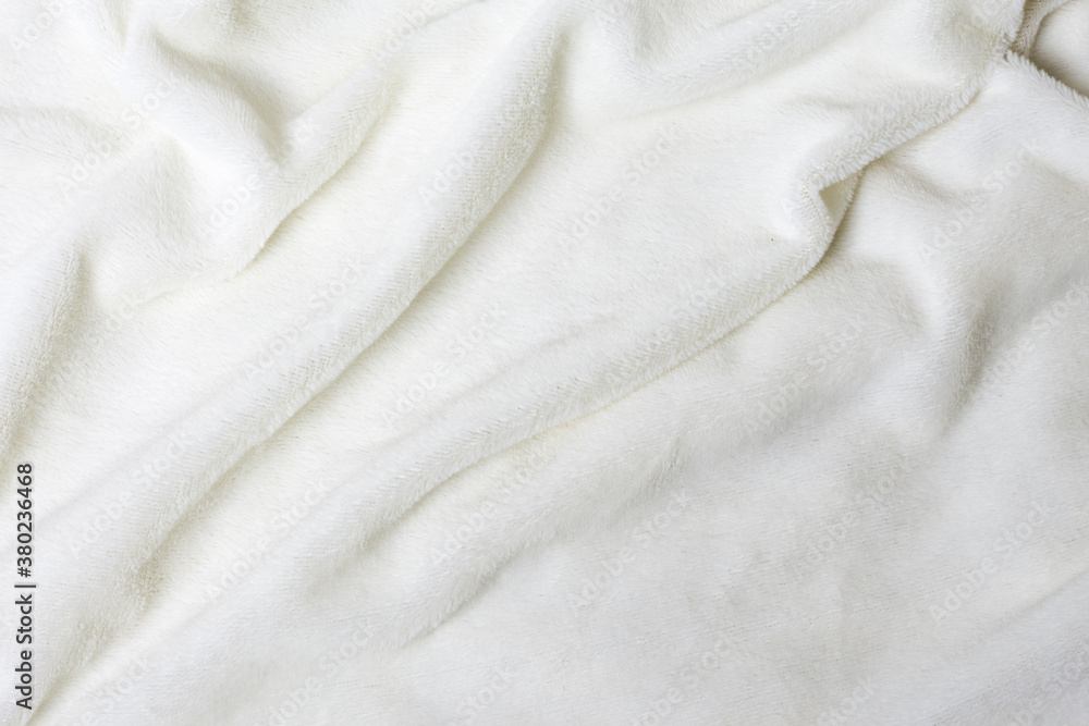 White faux fur texture, close-up, as background White faux fur texture, close-up, as background