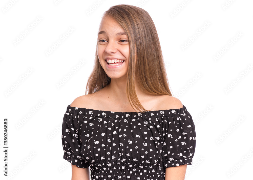 Beautiful teen girl smiling and looking away. Portrait of young pretty funny child, isolated on white background. Young happy teenager in studio. Beautiful teen girl smiling and looking away. Portrait of young pretty funny child, isolated on white background. Young happy teenager in studio.