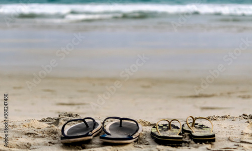 flip flops on the beach.