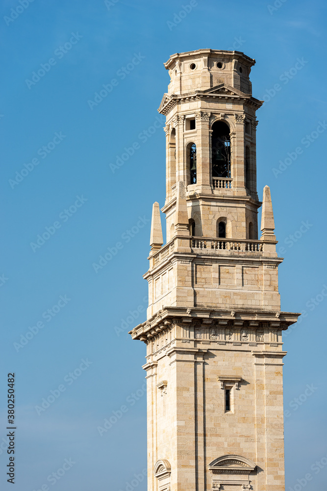 Closeup of the bell tower of the Verona Cathedral (Duomo of Santa Maria Matricolare, VIII-XII century) in Verona Downtown, UNESCO world heritage site, Veneto, Italy, Europe.