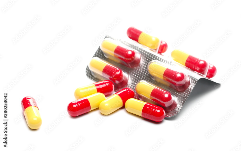 Pills in strip, medical capsules isolated on white background Pills in strip, medical capsules isolated on white background