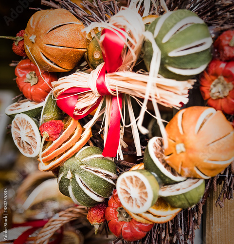 Dried fruit Christmas wreaths ( aka Christmas garlands ) on sale at Bath Christmas market. photo