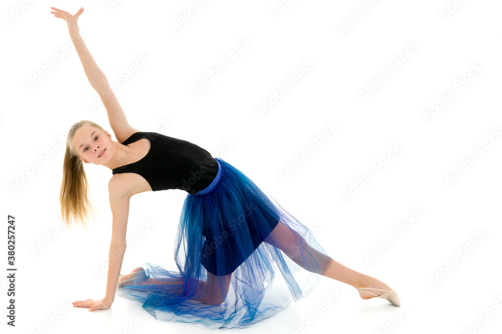 Graceful Girl Gymnast Performing Rhythmic Gymnastics Exercise. Graceful Girl Gymnast Performing Rhythmic Gymnastics Exercise.