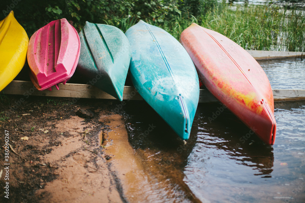 canoes on the shoreline.